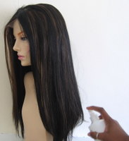 Spraying ends of hair with shampoo solution